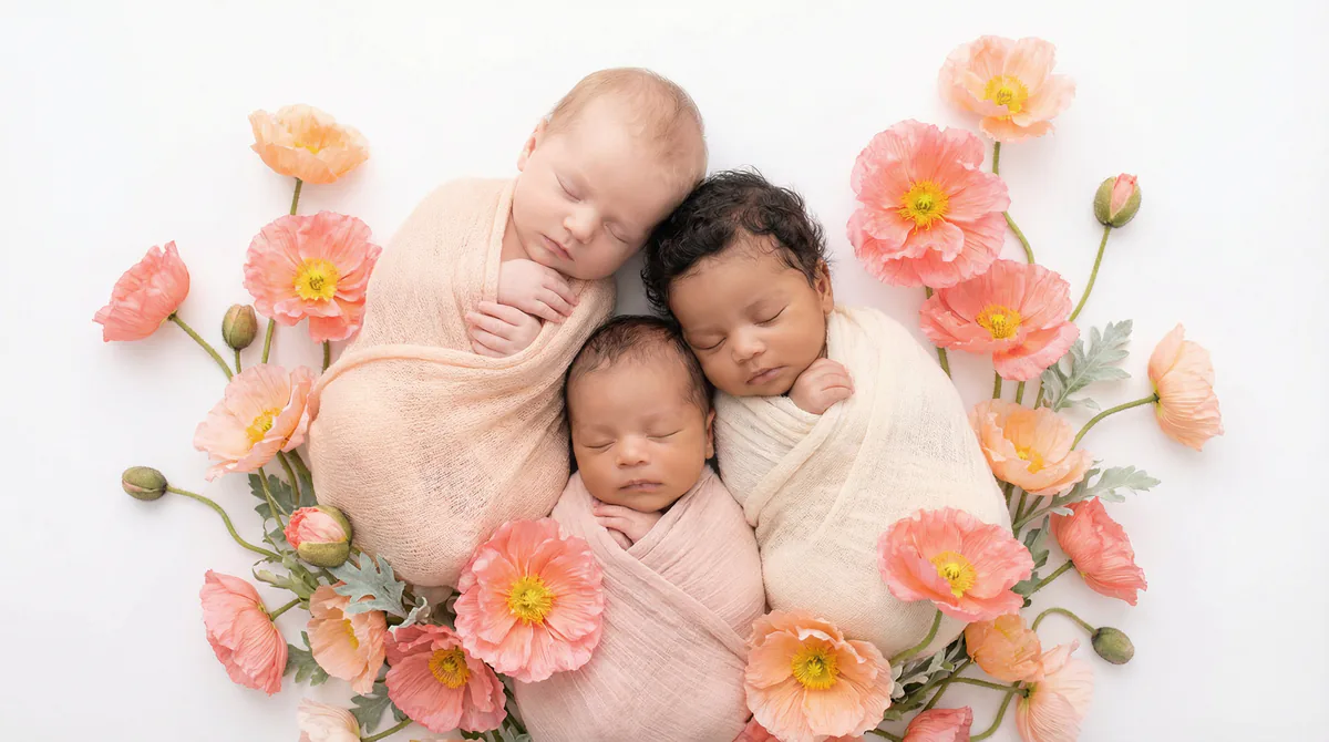 Diverse multicultural newborns in editorial fashion photoshoot with three newborns