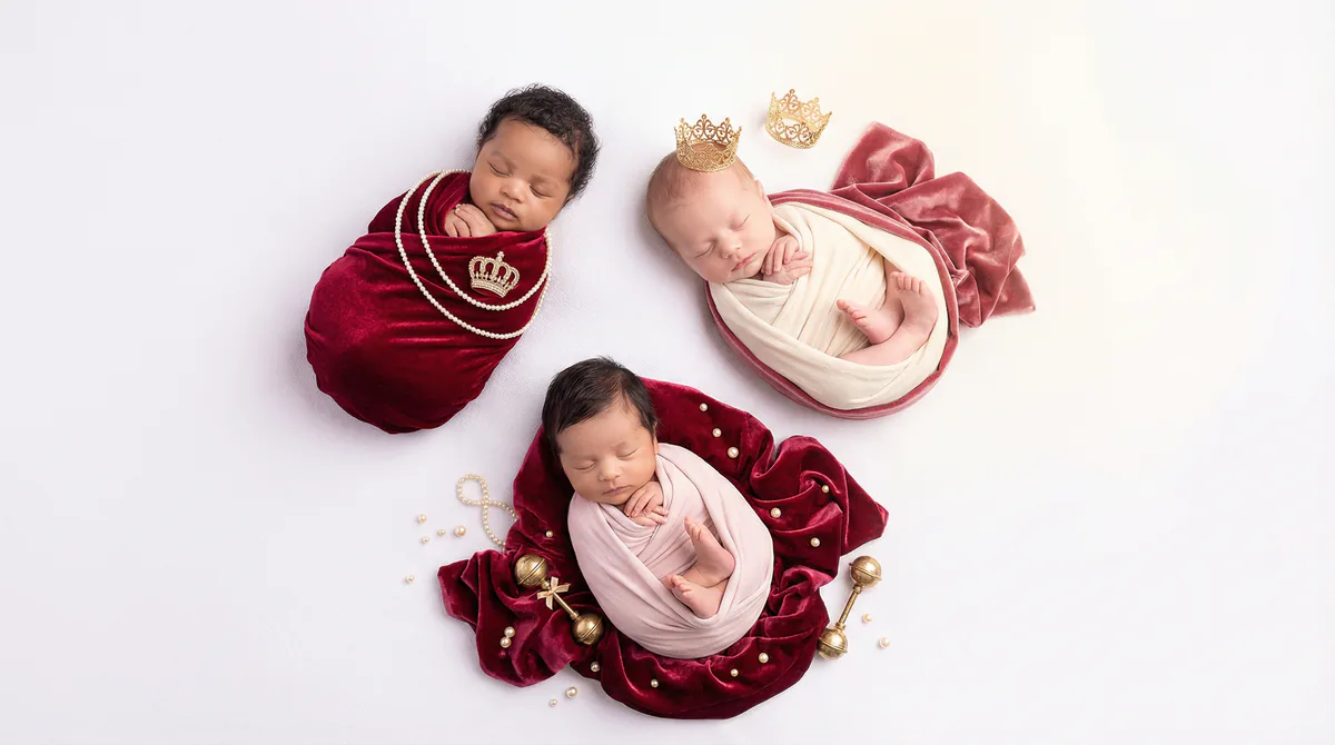 Diverse multicultural newborns in editorial fashion photoshoot with three newborns